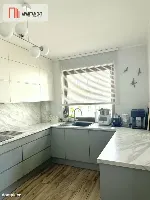 Nowoczesny apartament z dwoma balkonami oraz windą — zdjęcie 5