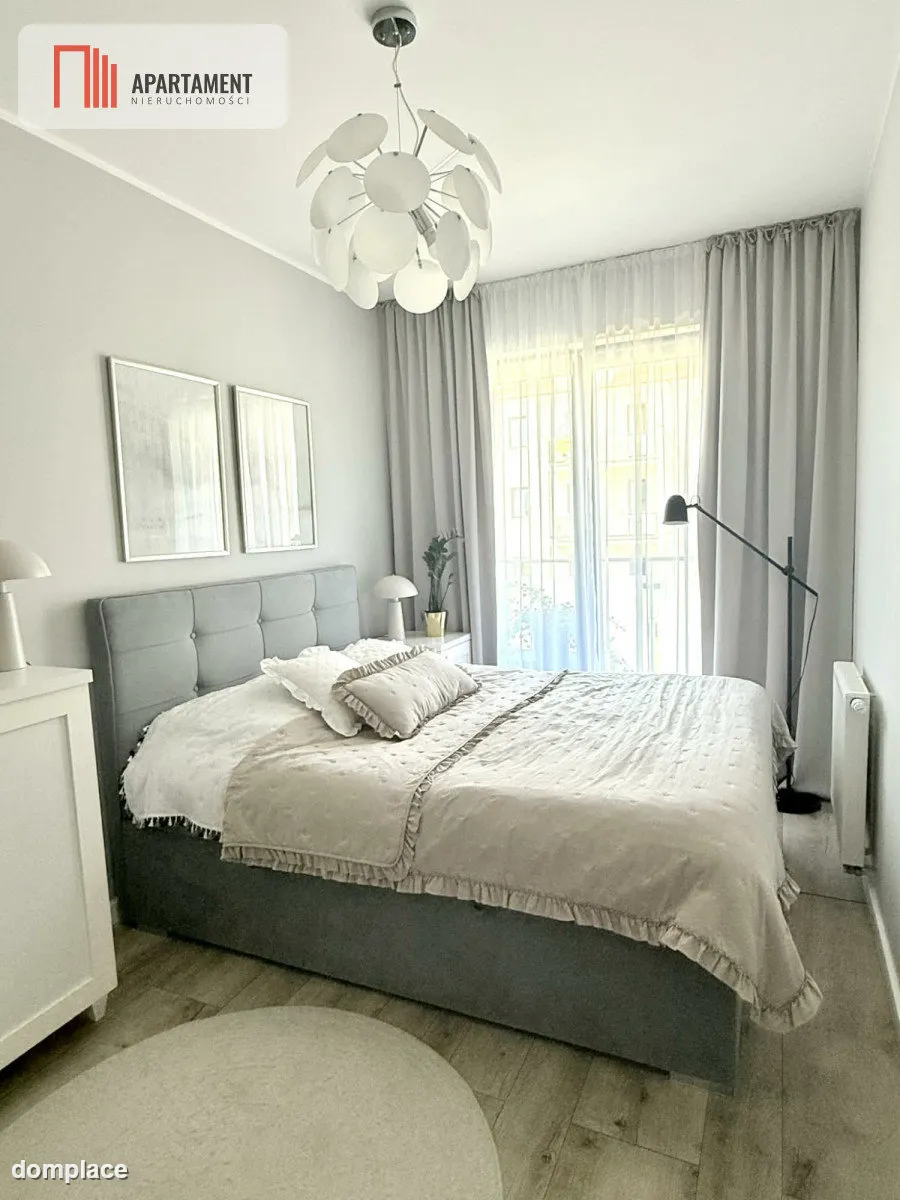 Nowoczesny apartament z dwoma balkonami oraz windą — zdjęcie 8