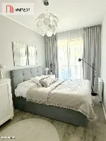Nowoczesny apartament z dwoma balkonami oraz windą — zdjęcie 8