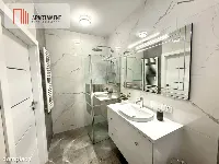 Nowoczesny apartament z dwoma balkonami oraz windą — zdjęcie 11
