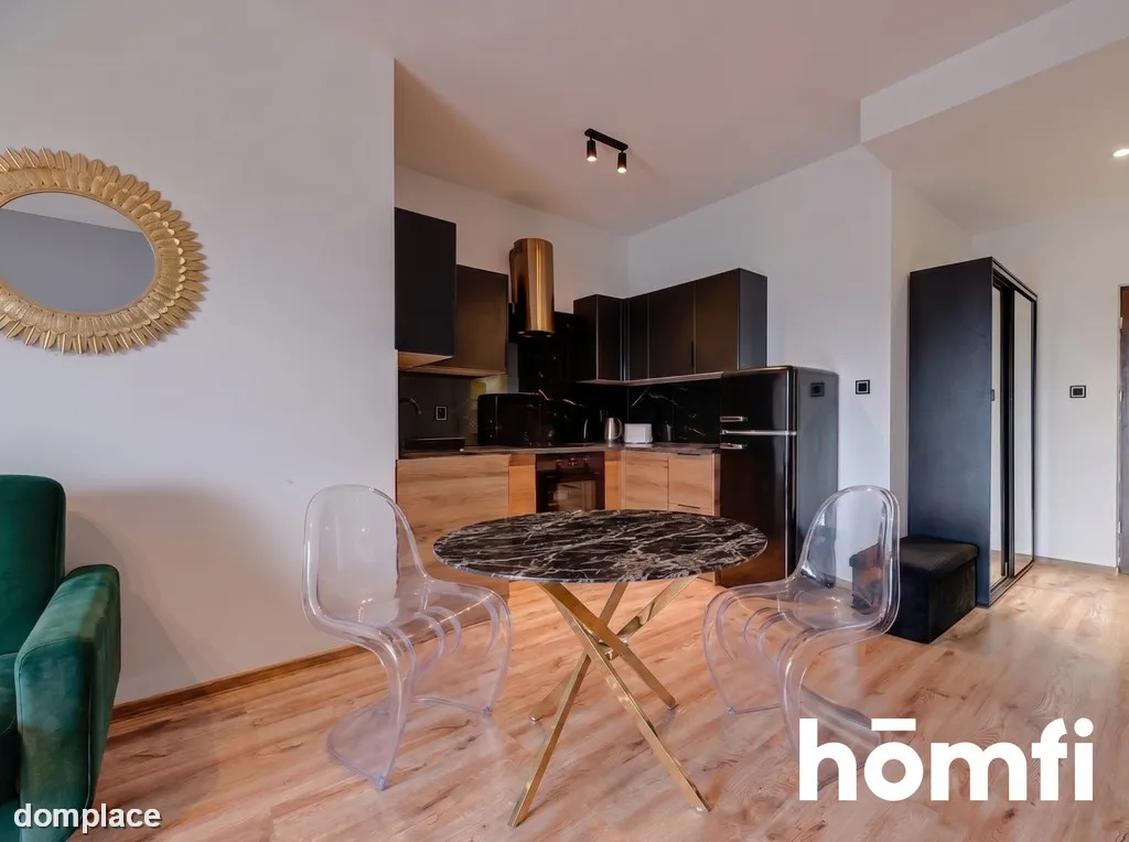PRZESTRONNA KAWALERKA W APARTAMENTOWCU