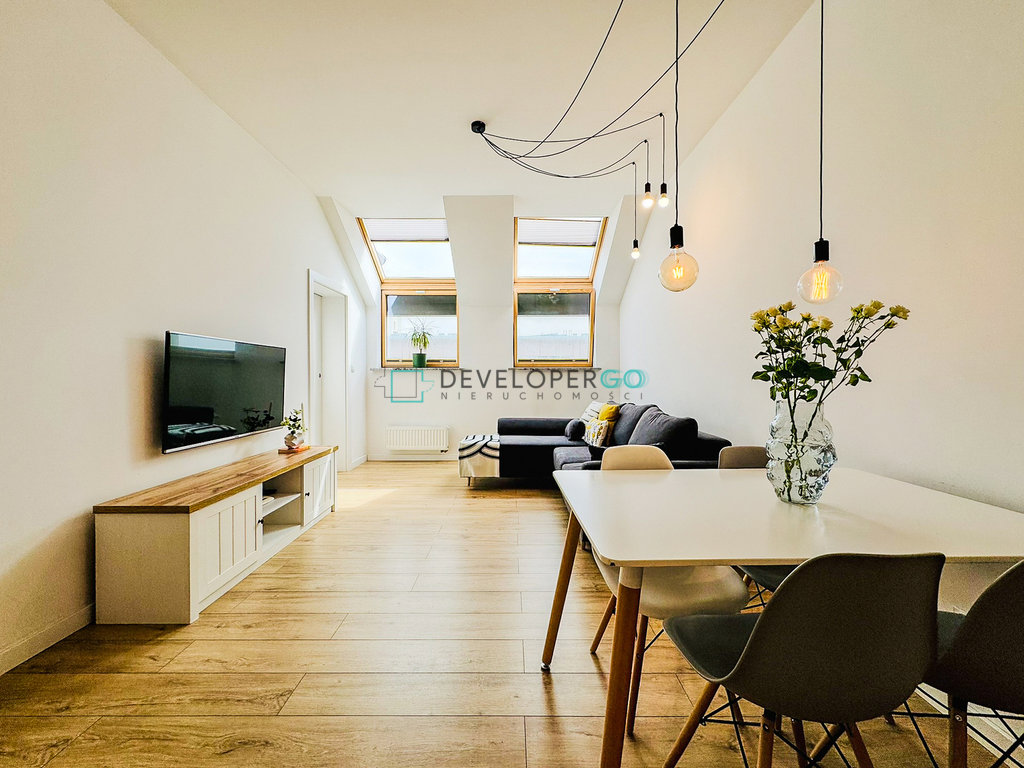 Zainwestuj w styl – loftowy apartament 102 m²