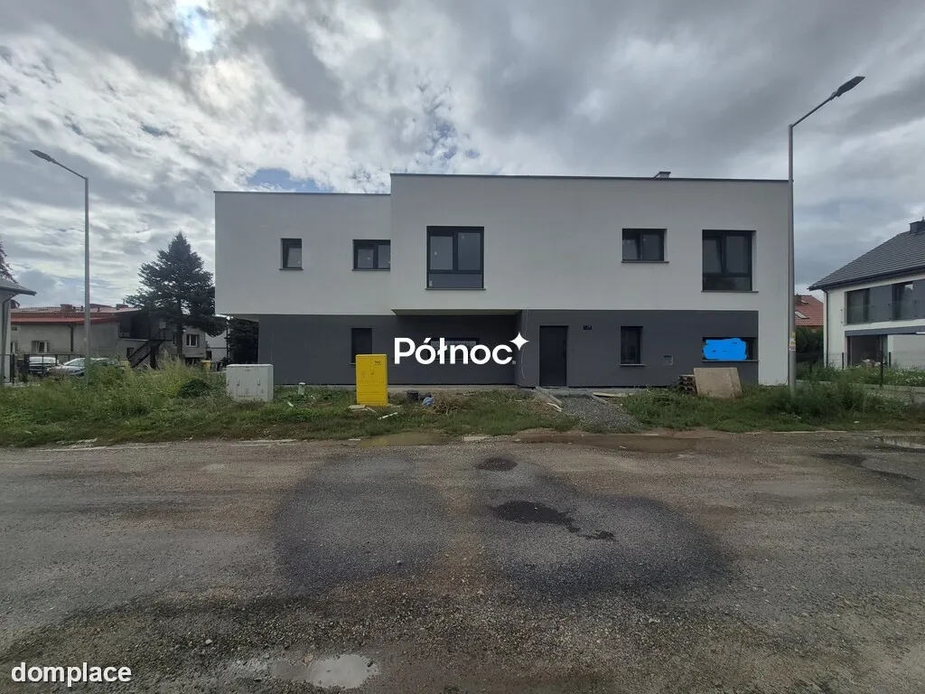 Dom w zabudowie bliźniaczej -os. Sienkiewicza