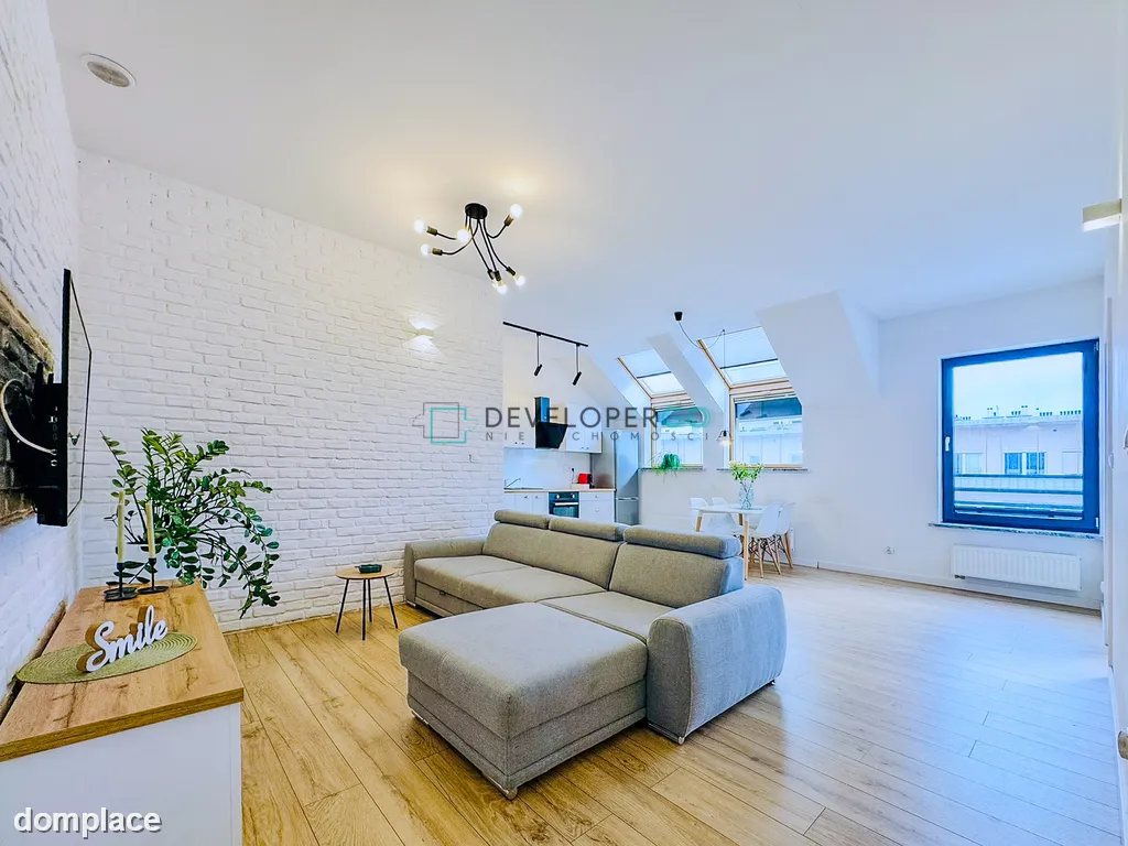 Zainwestuj w styl – loftowy apartament 102 m²