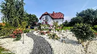 Atrakcyjny dom z piękną działką w Nowogrodźcu — zdjęcie 3