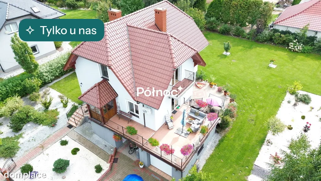Atrakcyjny dom z piękną działką w Nowogrodźcu
